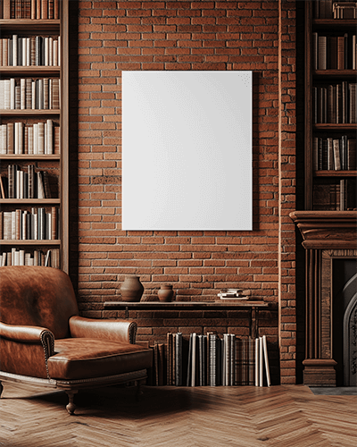 Vintage Library Canvas Mockup Wall Mounted On Exposed Brick Bookshelves Brown Leather Armchair Wooden Fireplace Cozy And Intellectual Ambience