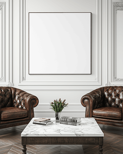 Classic Luxury Living Room Wall Canvas Mockup With White Paneled Walls Brown Leather Chesterfield Chairs And Marble Table