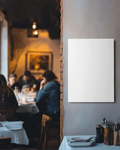 vertical-canvas-mockup-in-cozy-restaurant-wall-with-warm-ambience-and-dining-crowd