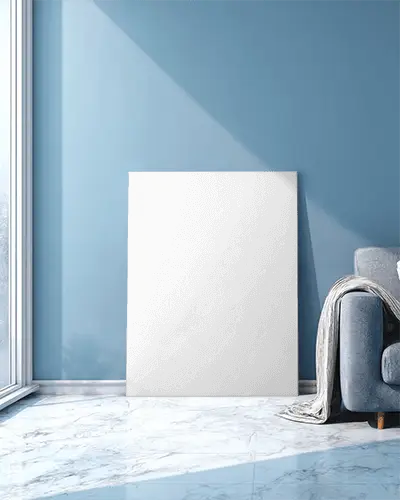 elegant-canvas-mockup-display-against-colorful-wall-next-to-sofa-with-cozy-blanket-drape