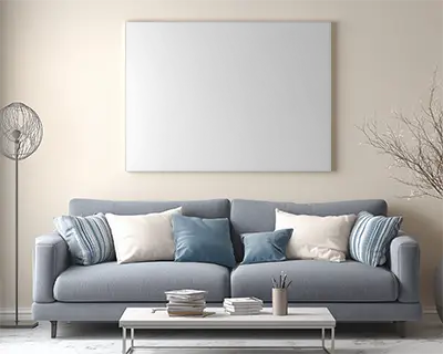 canvas-mockup-on-wall-in-cozy-living-room-setting-with-lamp-coffee-table-and-decor