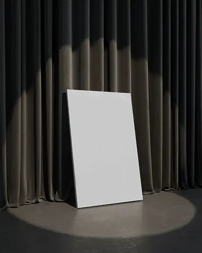 cinematic-canvas-mockup-leaning-against-dark-curtains-under-spotlight-minimal-modern-look