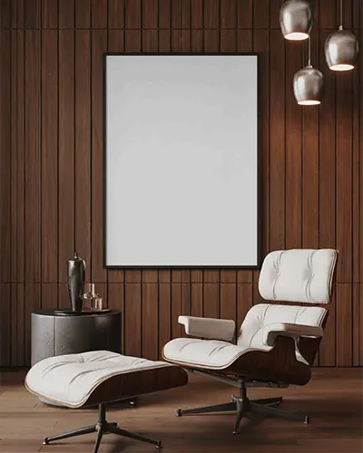 framed-canvas-mockup-on-wooden-wall-with-luxury-white-leather-chair-and-modern-lamps