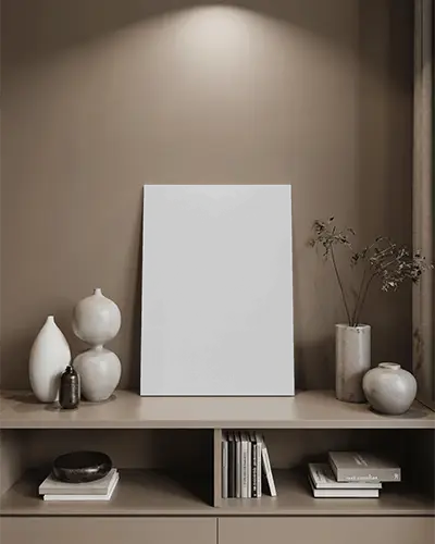 Vertical Canvas Mockup On Shelf With Modern Ceramic Vases Books And Subtle Wall Lighting