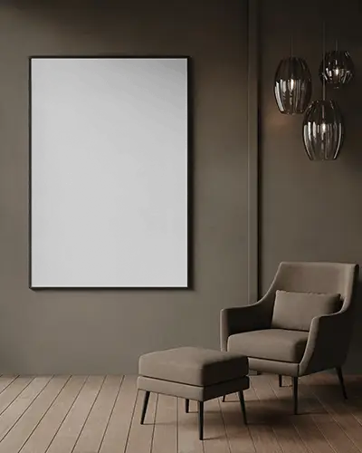 large-canvas-mockup-mounted-on-dark-wall-with-modern-armchair-footrest-and-pendant-lights