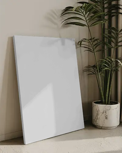 Leaning Canvas Mockup Beside Marble Planter With Greenery