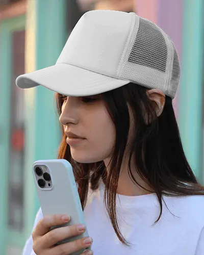Sporty Casual Trucker Cap And Phone Cover Mockup For Branding And Personalized Fashion Accessory