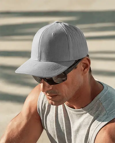 Street Style Cap Mockup Closeup Of Fit Male Model In Sporty Attire Under Natural Light