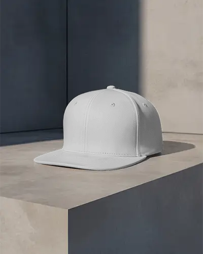 Minimalist Studio Cap Mockup Flat Bill Hat Placed On Modern Stone Surface With Shadows
