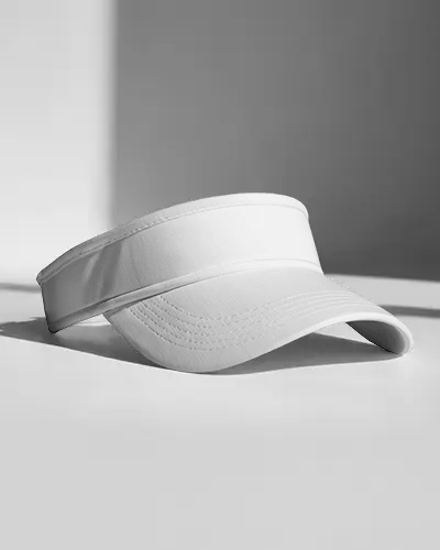 photorealistic-visor-cap-mockup-simple-display-on-floor-bright-lighting-minimal-fashion-shot