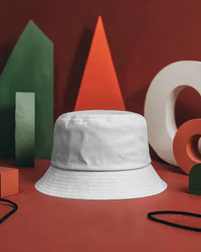stylish-bucket-hat-mockup-dark-cap-on-red-background-with-geometric-shapes-modern-display