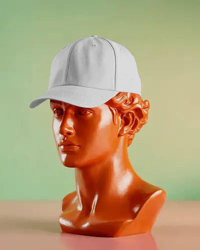 artistic-baseball-cap-mockup-on-orange-bust-statue-green-background-modern-scene