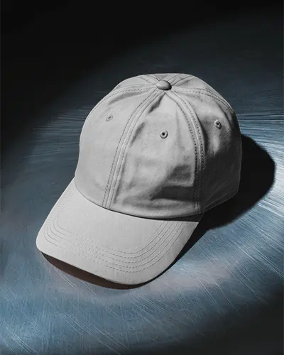 Dramatic Lighting Cap Mockup On Metallic Surface With Dark Shadow High Contrast Studio Look