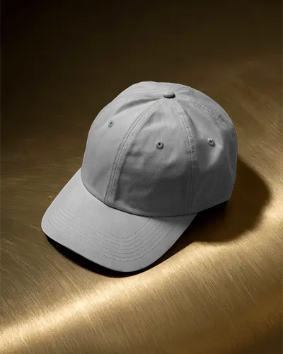 Stylish Cap Mockup On Golden Surface With Metallic Shine Premium Studio Fashion Presentation