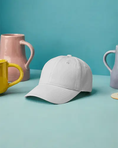 Casual Cap Mockup On Blue Desk With Colorful Mugs Creative Studio Display Modern Fashion Style