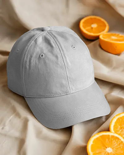 Lifestyle Cap Mockup On Fabric Surface With Fresh Orange Slices Stylish Summer Fashion Display