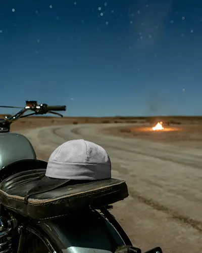 Night Ride Cap Mockup Resting On Motorcycle Seat Under Starry Sky
