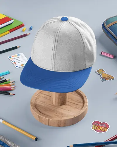 Classroom Desk Cap Mockup Featuring Blue Brim Hat With Stationery Around