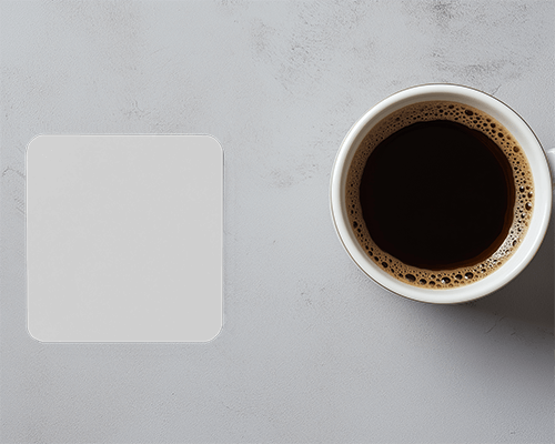 coaster-and-coffee-cup-on-light-marble