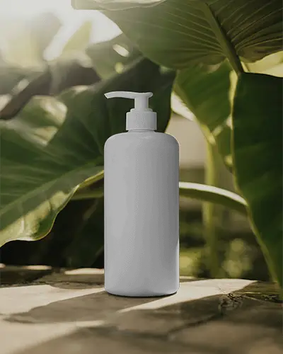 natural-skincare-pump-bottle-mockup-with-tropical-leaves-background-for-branding