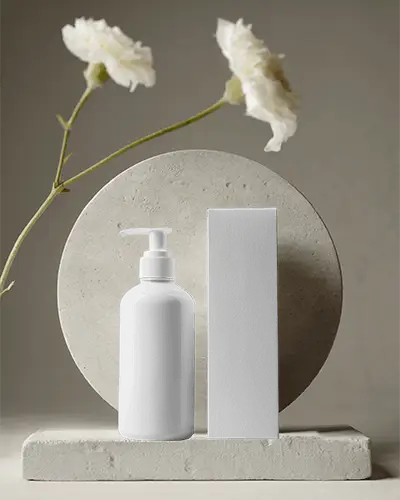 skincare-lotion-bottle-with-pump-mockup-and-packaging-box-mockup-on-natural-stone-display