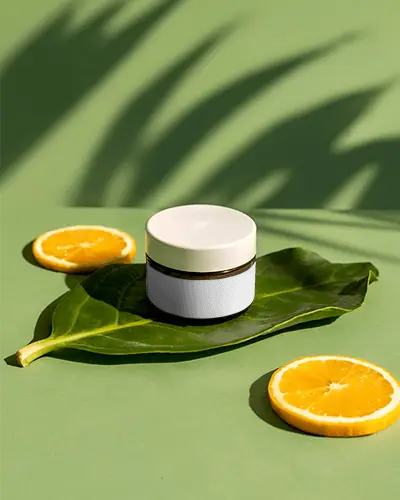 Organic Cosmetics Packaging Mockup With Greenery And Citrus Elements For Health Care Brand