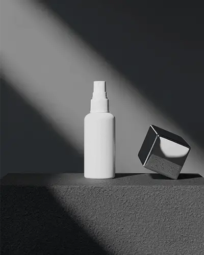 premium-cosmetic-spray-bottle-mockup-with-metallic-cube-on-textured-surface