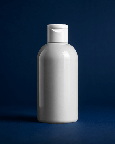 Sleek Cosmetic Bottle Mockup Minimalist White Container Against Deep Blue Background With Soft Lighting