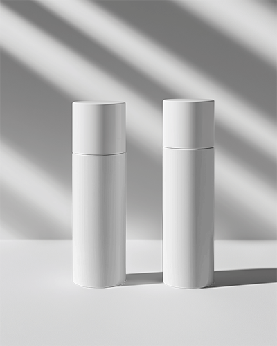 Premium Cosmetic Bottle Mockup Dual White Packaging In Modern Studio Setting With Soft Light And Contrast