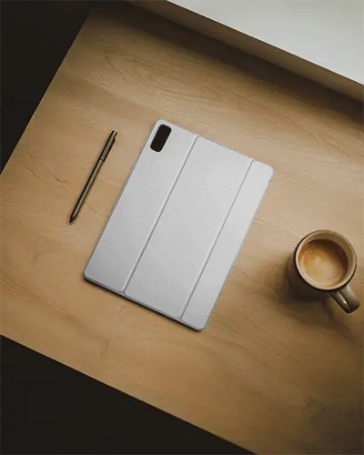 sleek-durable-tab-cover-mockup-on-wooden-surface-with-stylus-and-coffee-cup-accessories