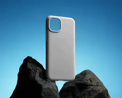 Premium Protective Phone Cover Mockup Showcased With Rocks Against Blue Gradient