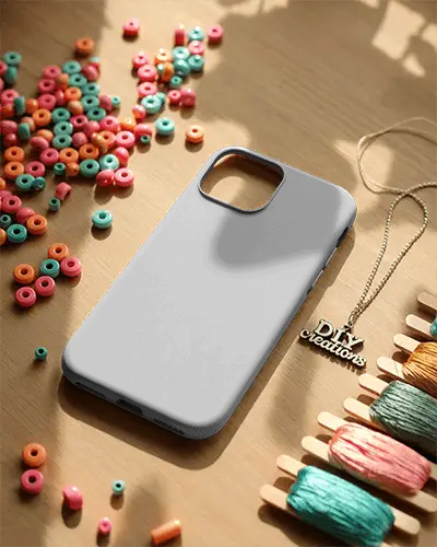Protective Iphone Case Mockup On Wooden Surface With Crafting Materials