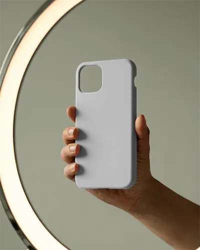 Realistic Phone Cover Mockup In Hand Against Minimalist Ringlight Background