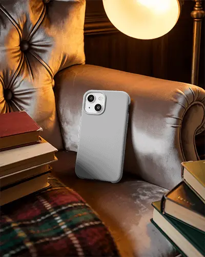 Phone Cover Mockup Resting On Cozy Leather Seat Near Old Books And Warm Light