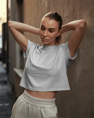 Urban Alley Crop Top Mockup Female Model Relaxing Against Textured Wall In Soft Evening Light 0101
