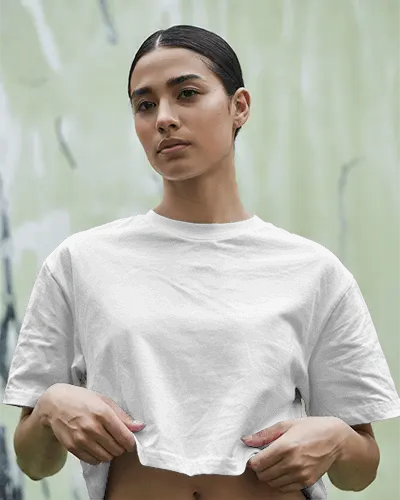 Realistic White Shirt Mockup Featuring Relaxed Female Model Outdoor Scene Perfect For Fashion 