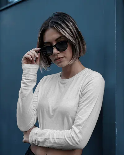 Minimalist Crop Top Mockup Long Sleeve Apparel Against Blue Metal Wall Streetwear Aesthetic