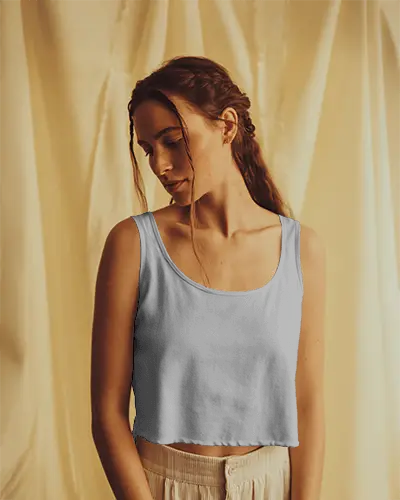 peaceful-crop-top-mockup-on-female-model-in-golden-hour-studio-with-soft-curtains