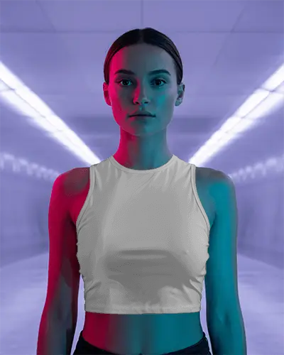 neon-lit-crop-top-mockup-on-female-model-in-symmetrical-underground-futuristic-tunnel