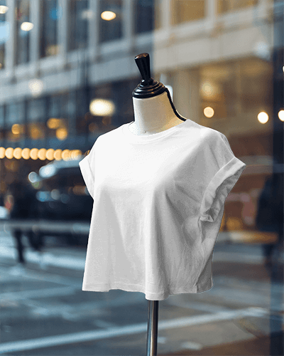 Luxury Crop Top Mockup Showcased On A Mannequin In Front Of Stylish Cityscape With Evening Lights And Urban Aesthetic