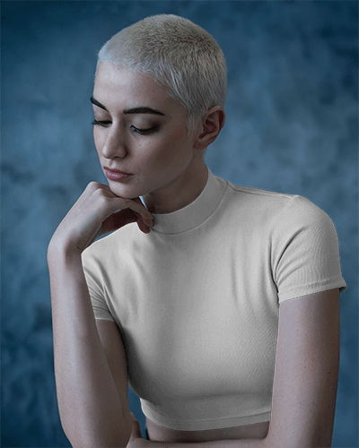 Moody Aesthetic Crop Top Mockup Female Model In Contemplative Pose With Bold Statement Design