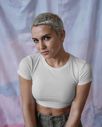 Stylish Crop Top Mockup Female Model Posing Boldly In Front Of Artistic Background