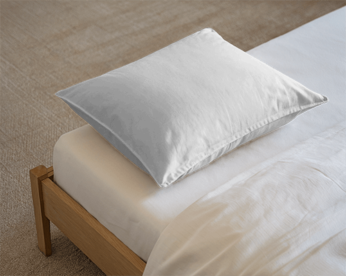 Cozy Bedroom Pillow Mockup On Wooden Bed With Soft White Bedding Natural Lighting And Warm Ambience 017