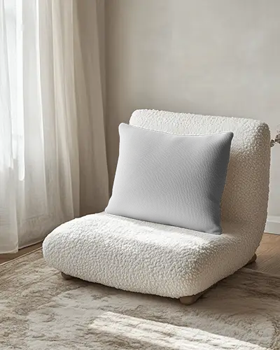neutral-toned-cushion-mockup-on-sherpa-accent-chair-with-soft-lighting-and-curtains-cozy-scandi-interior-vibes