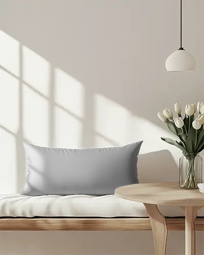 sunlit-minimalist-cushion-mockup-rectangular-pillow-on-wooden-bench-with-white-wall-tulips-and-hanging-lamp-cozy-modern-decor