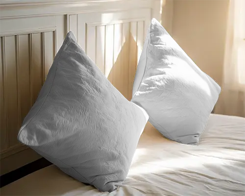 sunlit-bedroom-cushion-mockup-two-pillows-on-bed-against-wooden-panel-headboard-with-soft-light-059