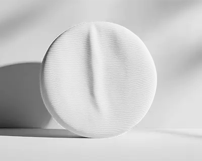 round-cushion-mockup-on-minimalist-background-with-soft-shadow-and-natural-lighting