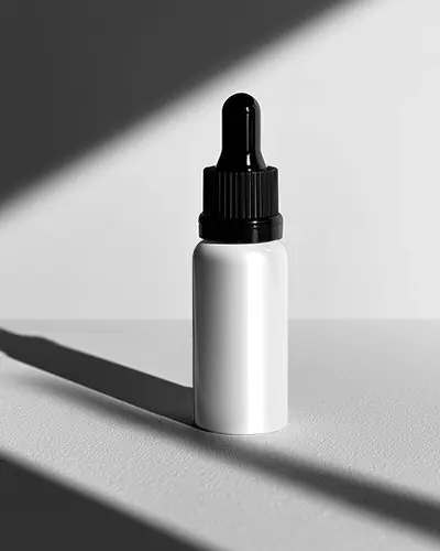 sleek-dropper-bottle-mockup-for-cosmetic-and-essential-oil-packaging-designs