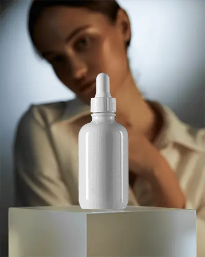 Elegant Dropper Bottle Mockup Minimal Studio Lighting With Soft Focus Model