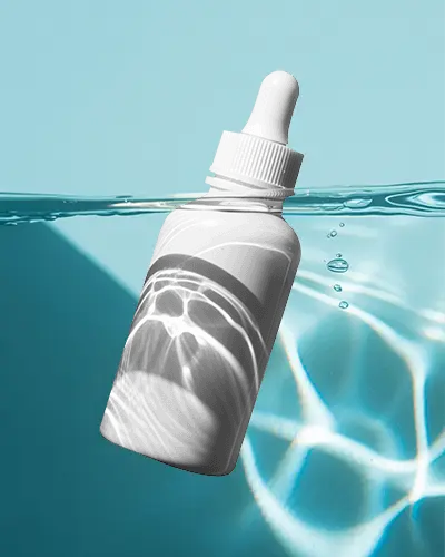 Aquatic Dropper Bottle Mockup Floating Underwater With Light Reflections